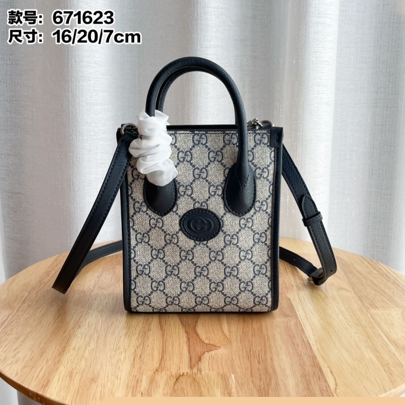 G*u*i top handle bags